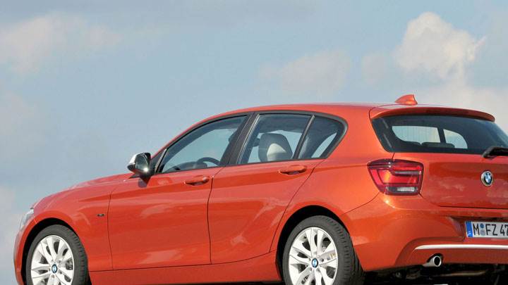2012 BMW 1-Series 120d Side Pose in Orange